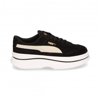 puma cruz negro blanco