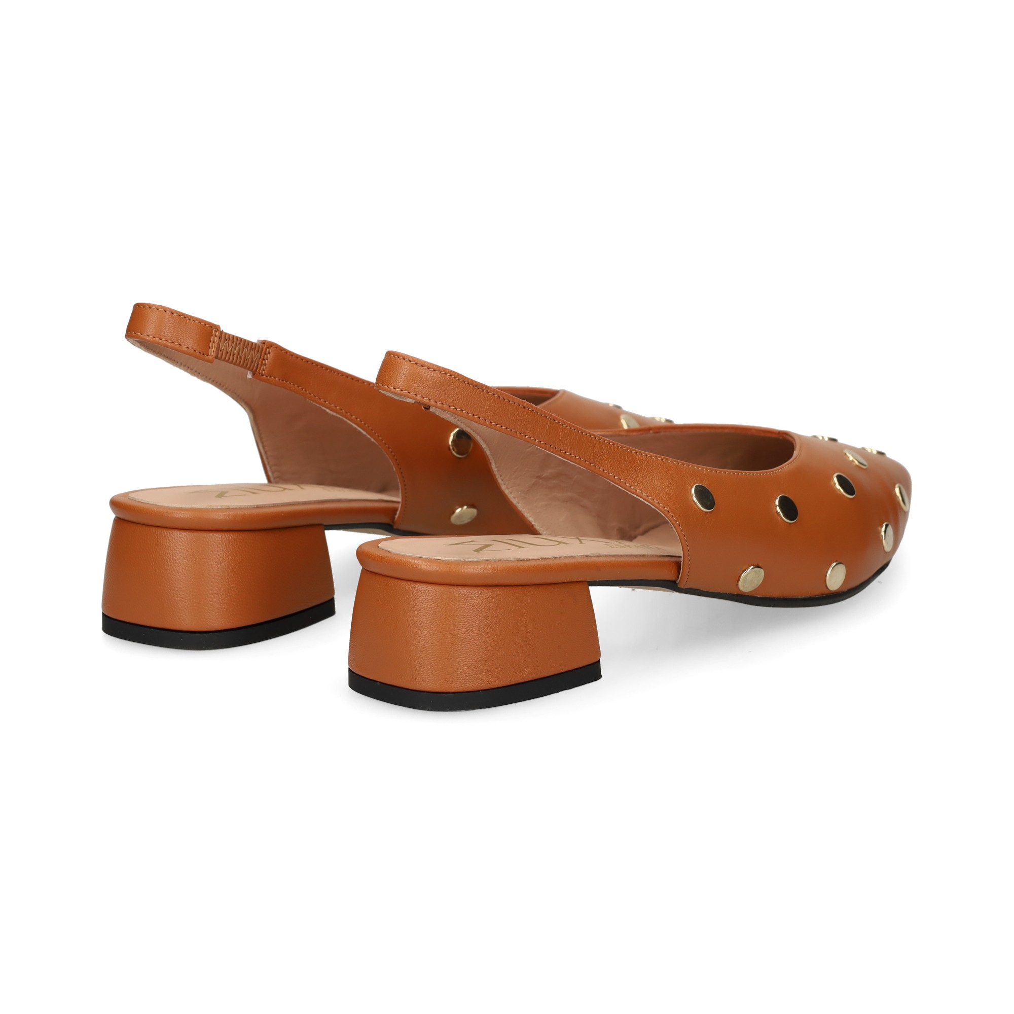 sin-talon-tachas-piel-cuero